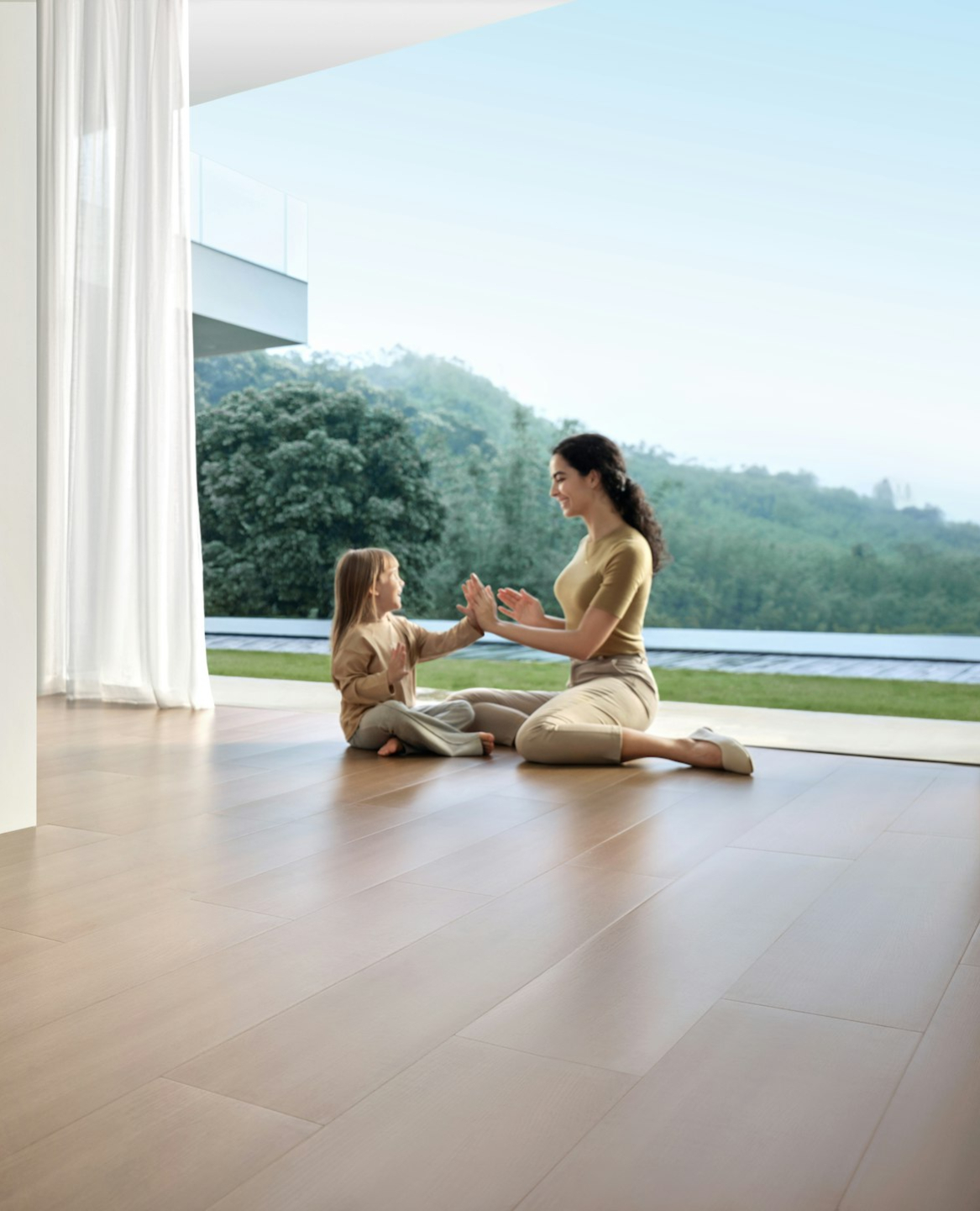 Woman and child playing near vacuum cleaner.